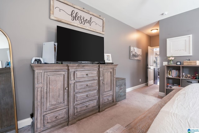 bedroom with light carpet