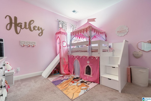 bedroom with light colored carpet