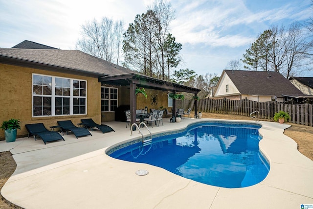 view of swimming pool featuring a pergola and a patio area