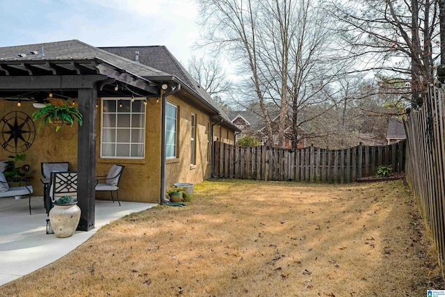 view of yard with a patio area