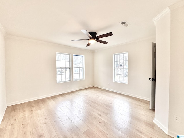 unfurnished room with crown molding, ceiling fan, and light wood-type flooring