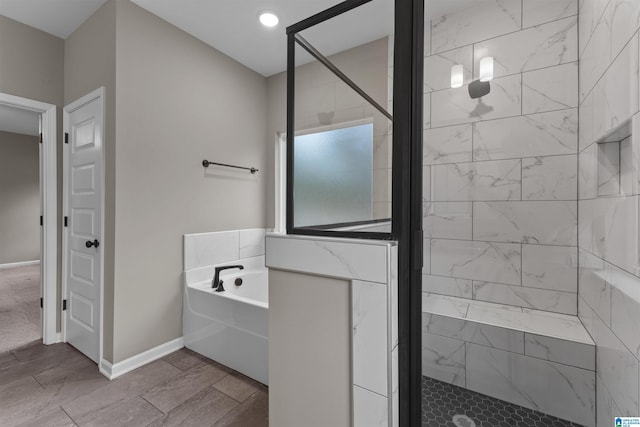 bathroom featuring plus walk in shower