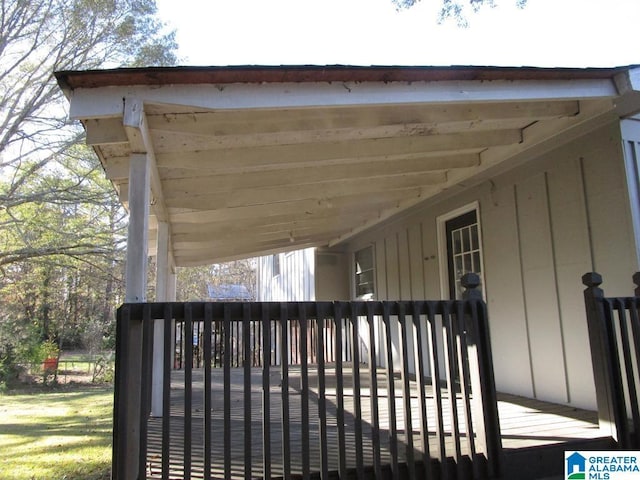 view of gate with a deck