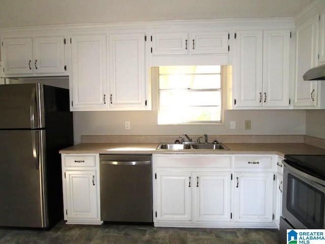 kitchen featuring white cabinetry, sink, and appliances with stainless steel finishes