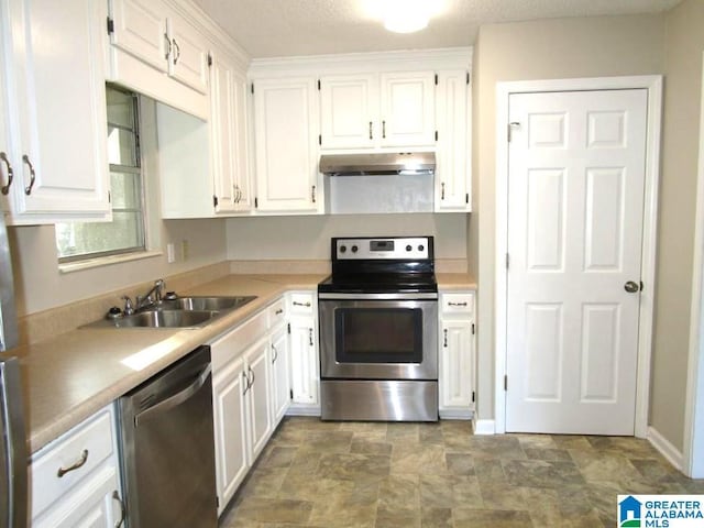 kitchen featuring white cabinetry, appliances with stainless steel finishes, and sink