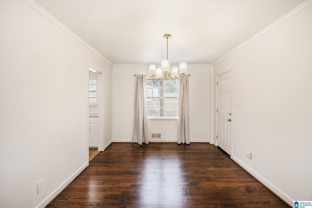 unfurnished dining area with ornamental molding, baseboards, an inviting chandelier, and wood finished floors