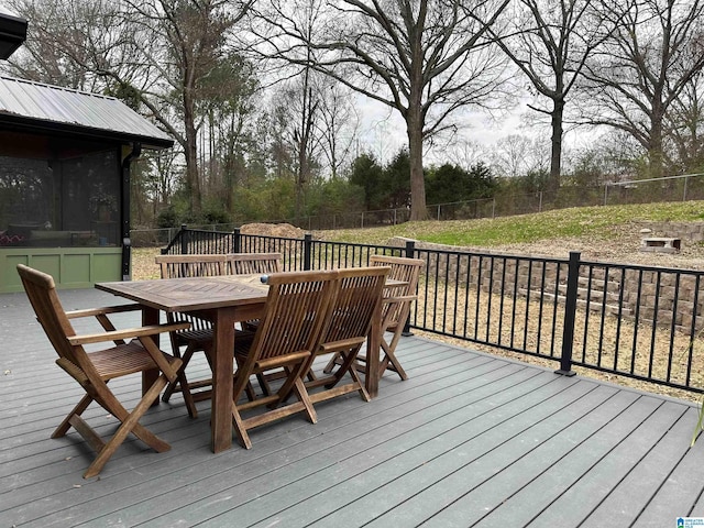 deck with a sunroom