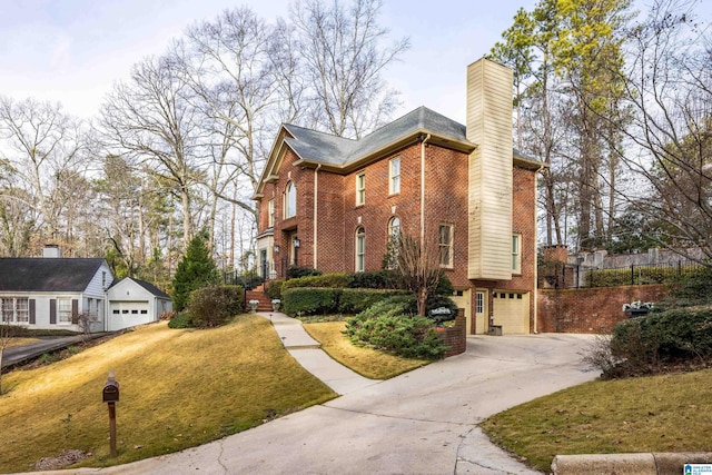 view of home's exterior featuring a garage and a yard