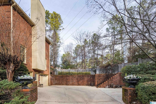 view of patio with a garage