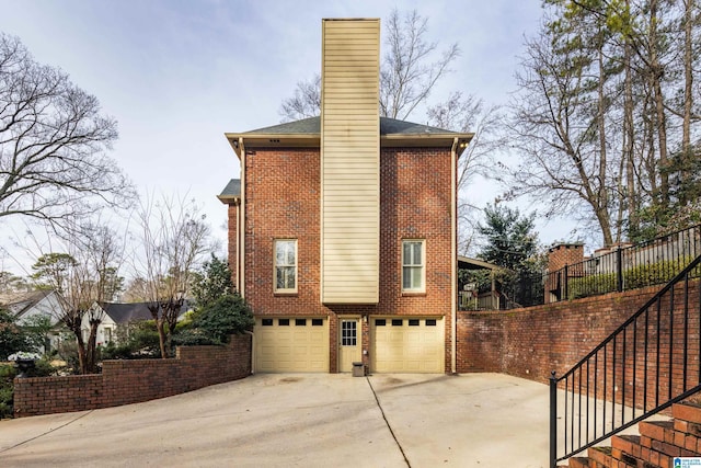 view of property exterior with a garage