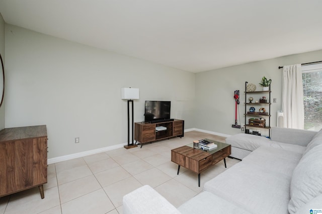 living room with light tile patterned floors