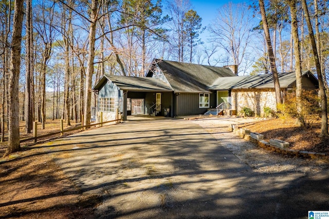 exterior space featuring a carport