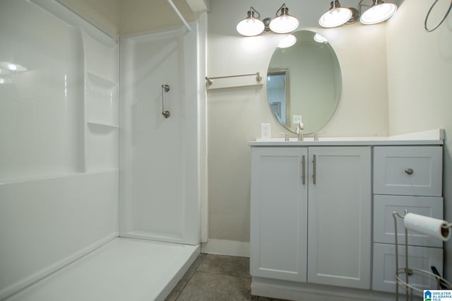 bathroom with vanity and tile patterned floors