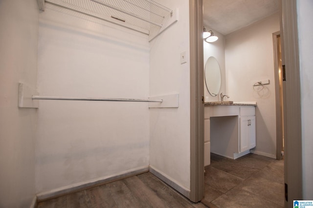 spacious closet with sink