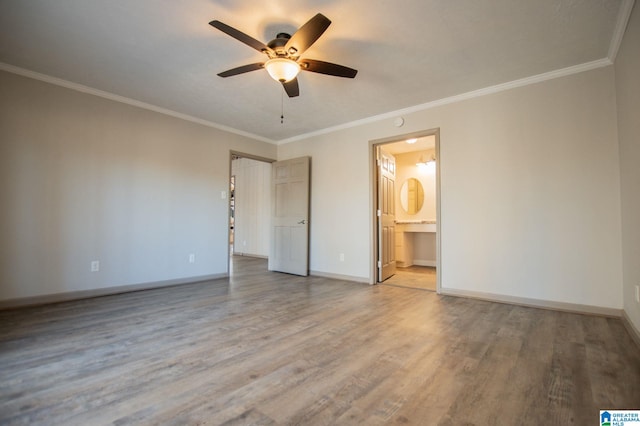 unfurnished bedroom with ceiling fan, ornamental molding, ensuite bath, and light wood-type flooring