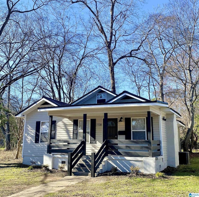 7708 6th Ave, Birmingham, AL 35206 - bungalow-style house featuring a porch