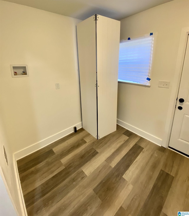 unfurnished bedroom featuring hardwood / wood-style floors