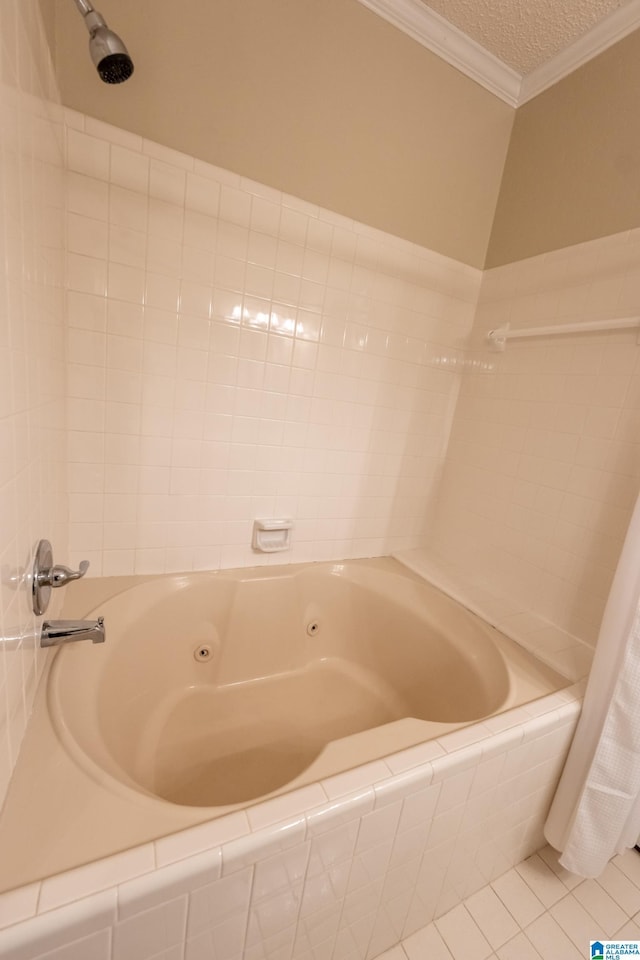 bathroom with crown molding, tiled bath, tile patterned floors, and a textured ceiling