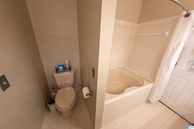 bathroom featuring shower / bathtub combination with curtain, tile patterned floors, and toilet