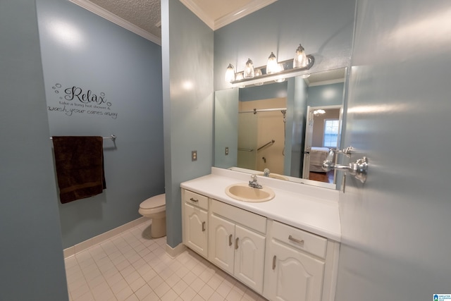 bathroom with ornamental molding, toilet, tile patterned floors, and vanity