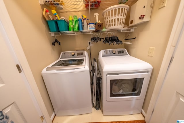 laundry area featuring washer and clothes dryer