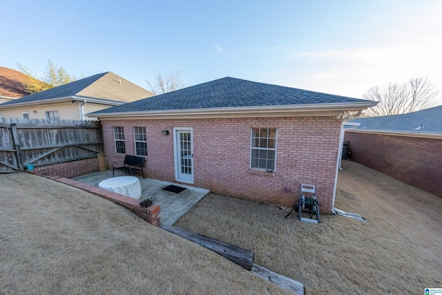 back of house with a patio area