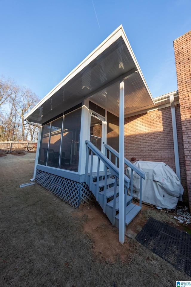 exterior space with a sunroom