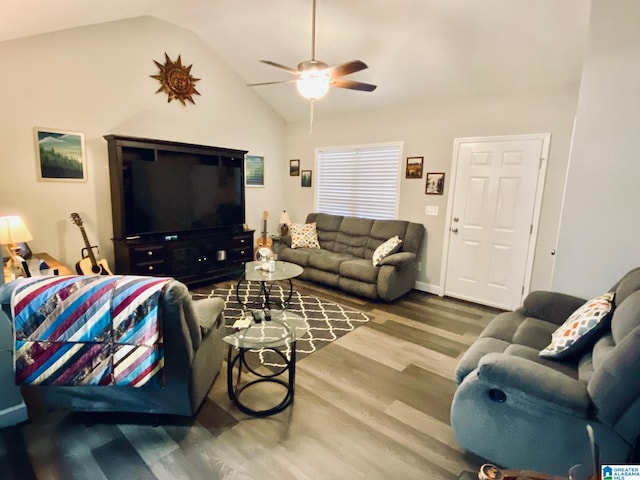 living room with lofted ceiling, wood-type flooring, and ceiling fan