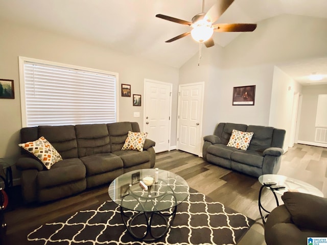 living room with ceiling fan, lofted ceiling, and wood-type flooring