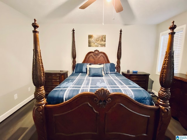 bedroom featuring hardwood / wood-style flooring and ceiling fan