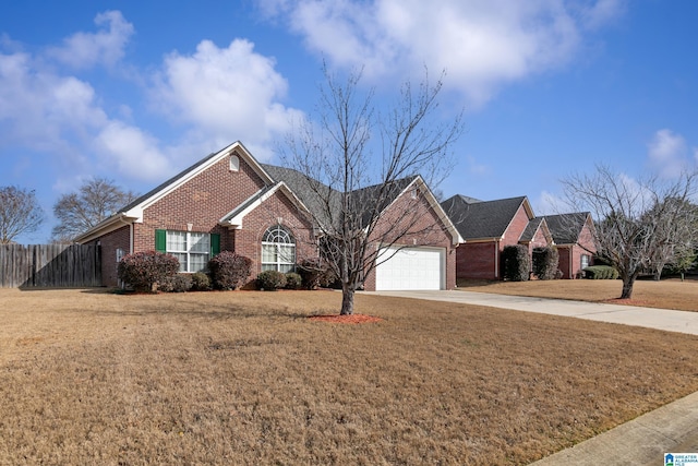 ranch-style home featuring a garage and a front lawn