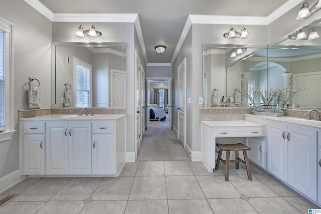 bathroom with vanity, ornamental molding, and tile patterned floors