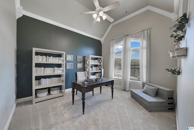 office area with crown molding, vaulted ceiling, light colored carpet, and ceiling fan