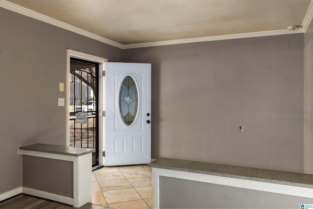 entrance foyer featuring crown molding