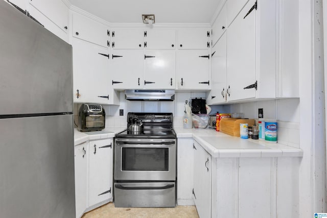 kitchen with stainless steel appliances and white cabinets