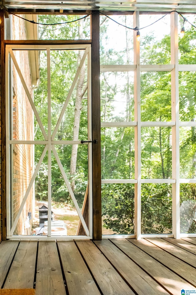 doorway to outside featuring hardwood / wood-style flooring