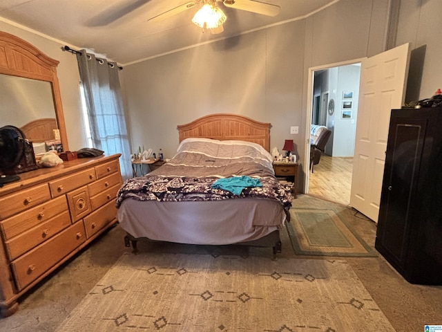 bedroom with crown molding and ceiling fan