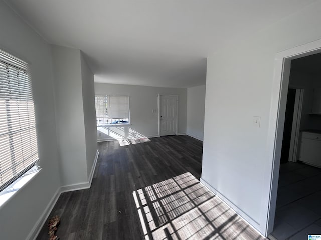 corridor with dark wood-type flooring