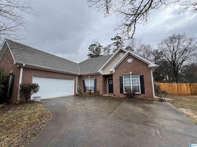 single story home with a garage