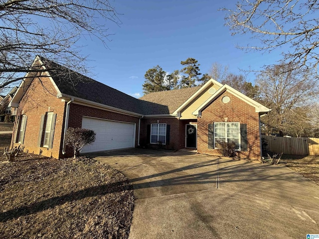 ranch-style house featuring a garage