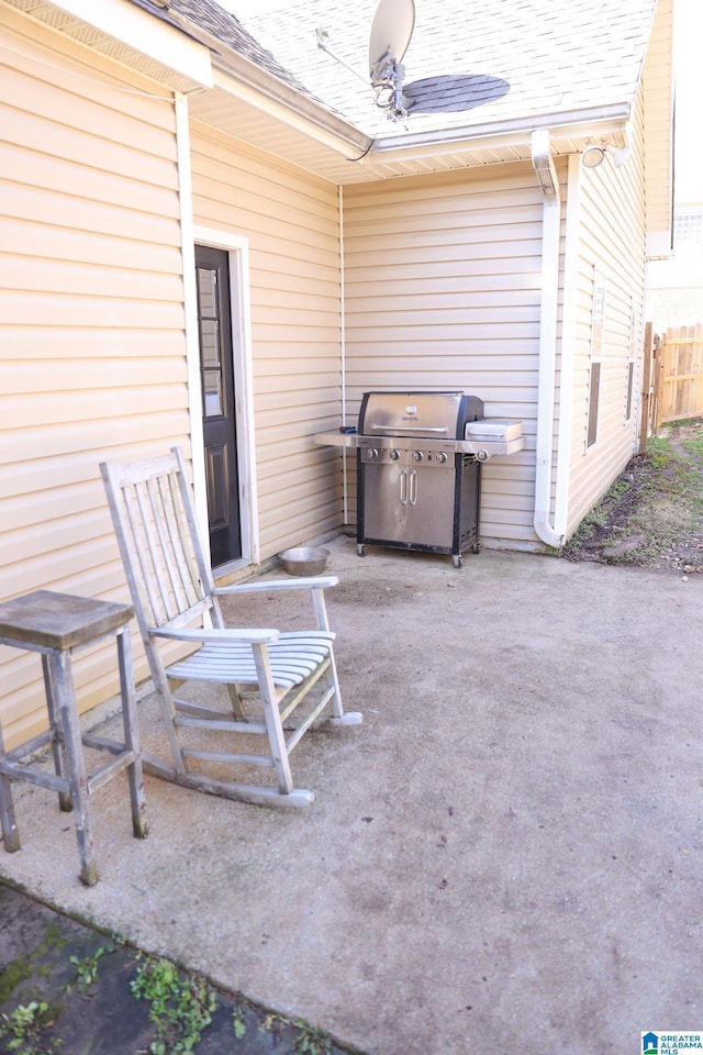 view of patio / terrace with a grill and ceiling fan