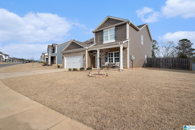 craftsman inspired home with a garage