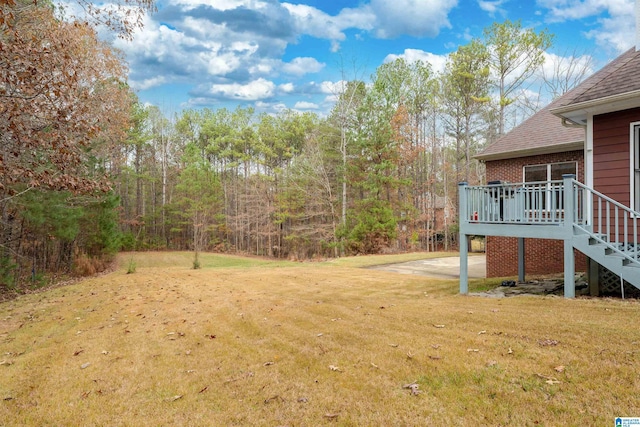 view of yard featuring a deck