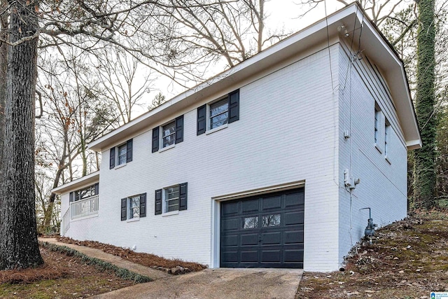 view of property exterior with a garage