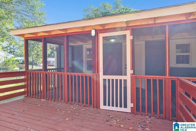 deck featuring a sunroom