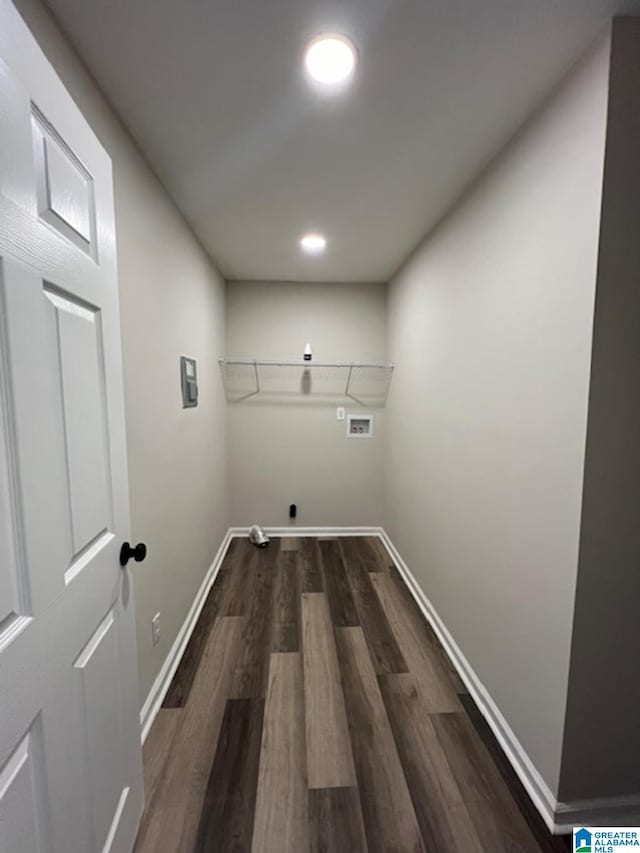 laundry area featuring gas dryer hookup, dark hardwood / wood-style floors, and washer hookup