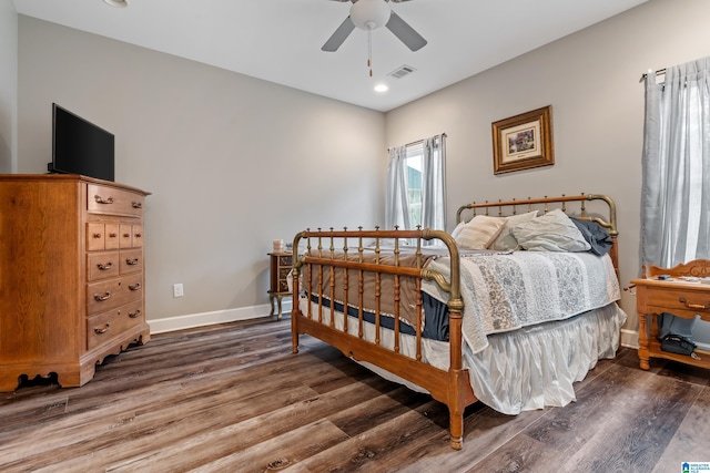 bedroom featuring ceiling fan and wood-type flooring