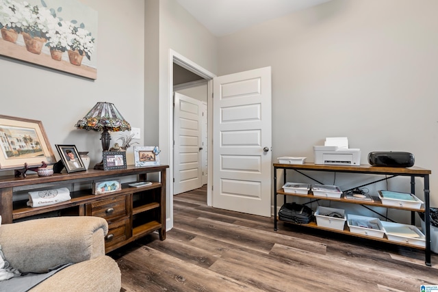 office with dark wood-type flooring