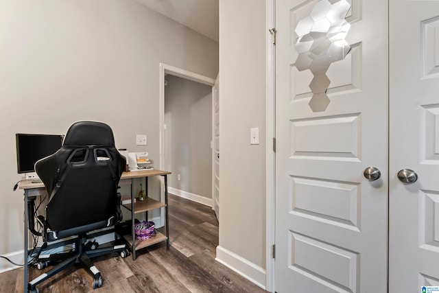 office with dark wood-type flooring