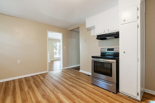 kitchen featuring white cabinetry, stainless steel electric stove, and light hardwood / wood-style floors